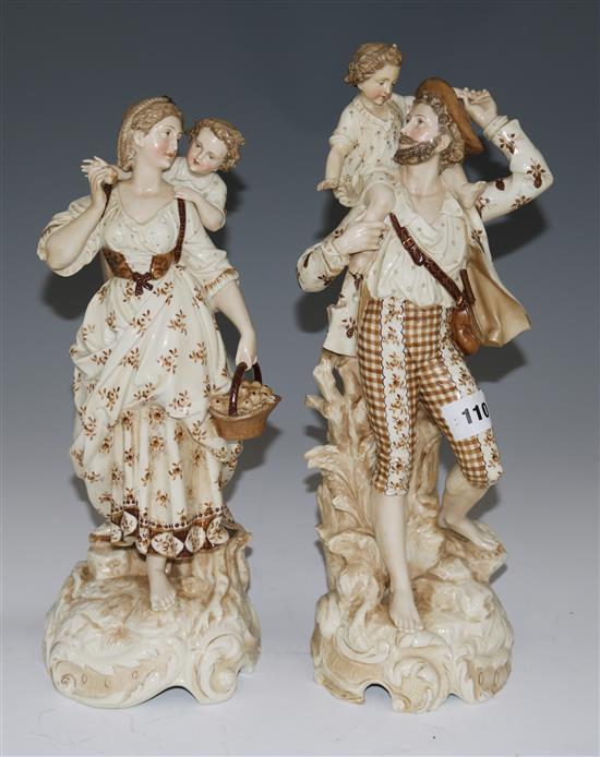 A pair of late 19th century Paris porcelain figure groups, 44cms